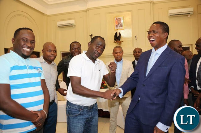President Lungu poses for a photo with Jerabos after a meeting at State House on Friday.