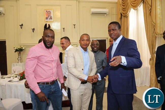 President Lungu poses for a photo with Jerabos after a meeting at State House on Friday.