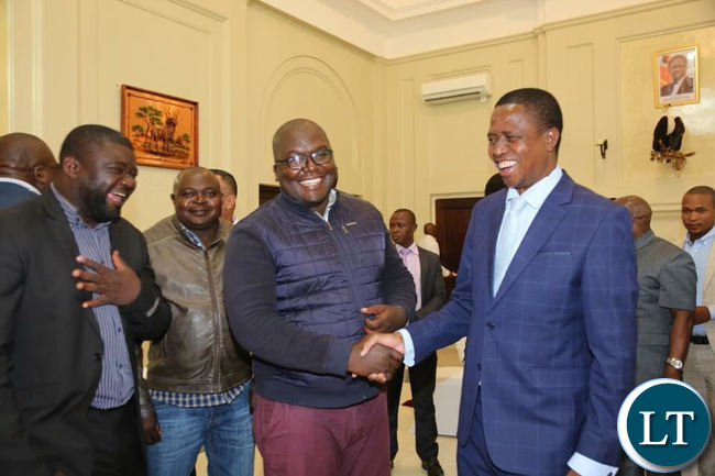 President Lungu poses for a photo with Jerabos after a meeting at State House on Friday.