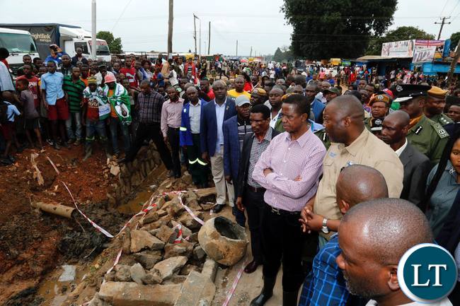 President Edgar Lungu (centre) accompanied by Copperbelt Province Minister Bowman Lusambo (second from right) walks on the streets of Masala Township in Ndola on Friday, February 9,2018. PICTURE BY SALIM HENRY/STATE HOUSE ©2018