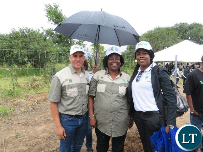 Jean Kapata (centre) poses for a photo with WWF Zambia Country Director Nachilala Nkombo during the the commemoration of the 2017/2018 national tree planting season