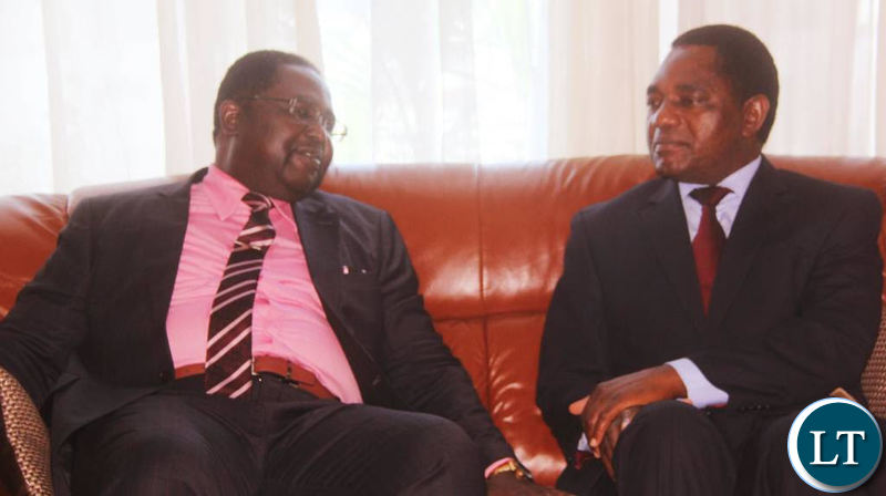 Bishop Imakando confers with HH