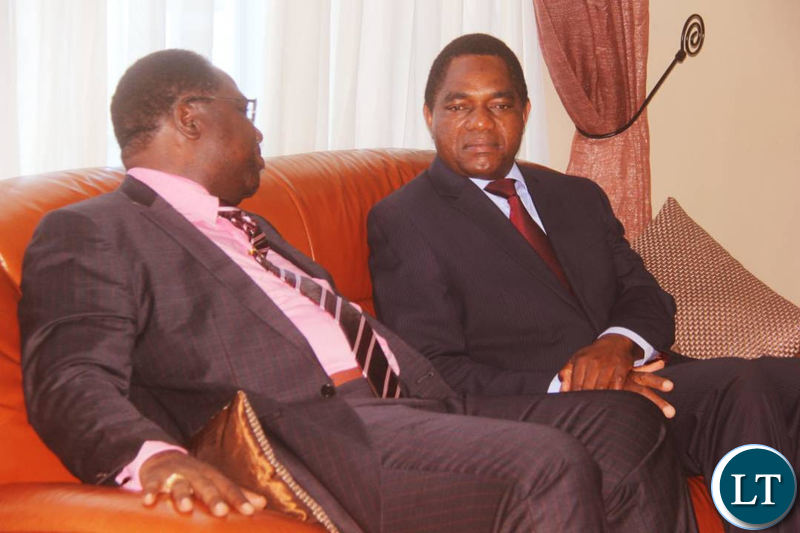 Bishop Imakando confers with HH