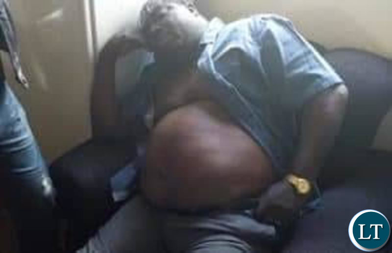A tired looking Kambwili takes a nap at Woodlands Police Station