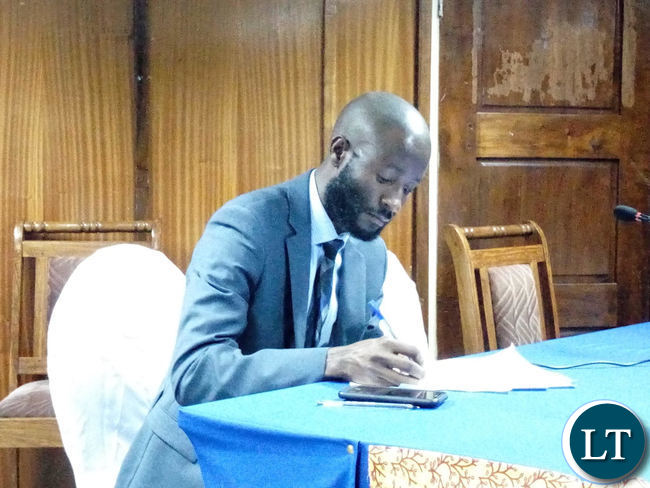 Dr Sishuwa Sishuwa taking some notes during a public discussion organized by the Oasis Forum in Lusaka on Tuesday evening