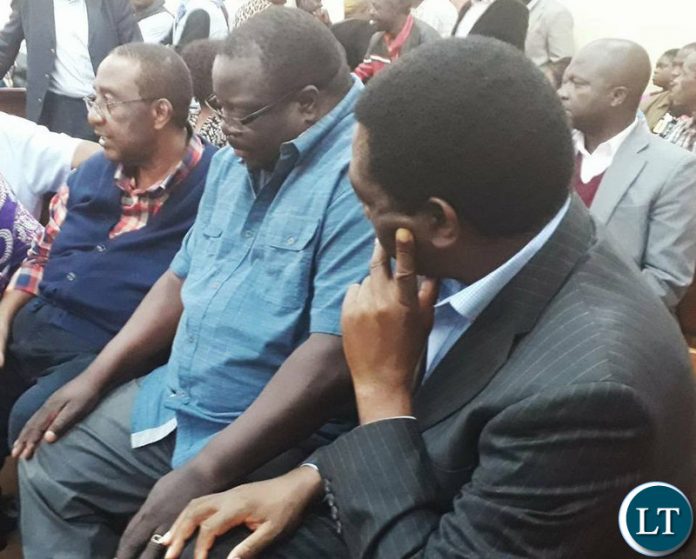 Kambwili flanked by HH and GBM at Court on Tuesday afternoon