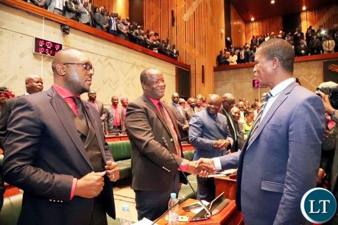President Edgar Lungu greets Mr JACK MWIIMBU MONZE UPND member of Parliament after the State of the Nation Address on the Application of National values and Principles