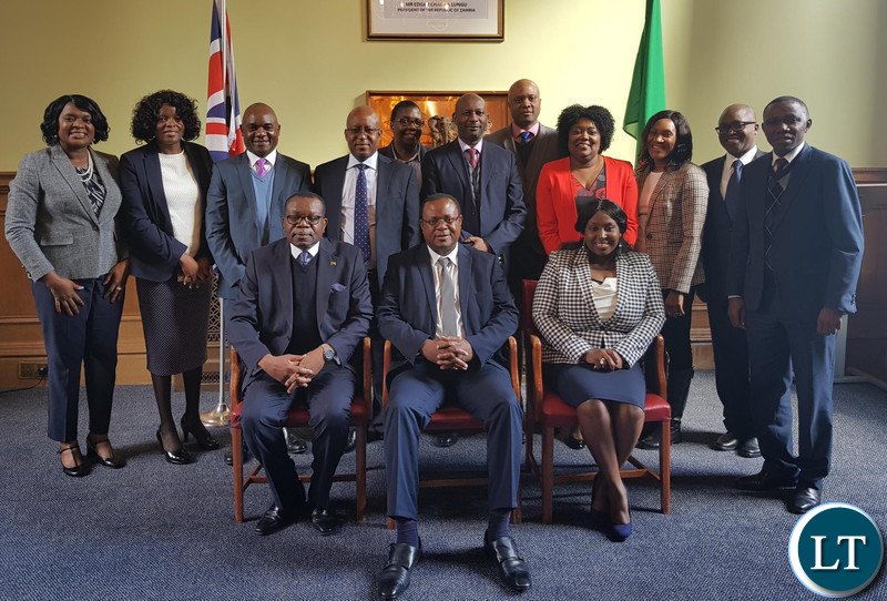 Zambia High Commission London Staff pose for a picture with Dr. Simwinga.