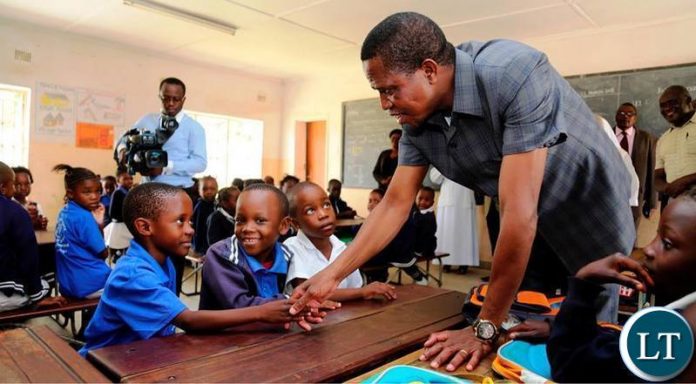 President Edgar Chagwa Lungu (left) autographs the visitors book during his visit to Divine Providence Convent School in Chawama,Lusaka on Friday,March 23,2018. PICTURE BY SALIM HENRY/STATE HOUSE ©2018