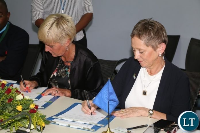 World Bank Country Manager Ian Ruthernberg and Swedish Embassy Deputy Head of Mission Karin Svernken signing the Administrative Grant agreement between Government of Sweden and World Bank on Electricity Service Access Project during the signing ceremony World Bank Country Manager Ian Ruthernberg and Swedish Embassy Deputy Head of Mission Karin Svernken signing the Administrative Grant agreement between Government of Sweden and World Bank on Electricity Service Access Project during the signing ceremony