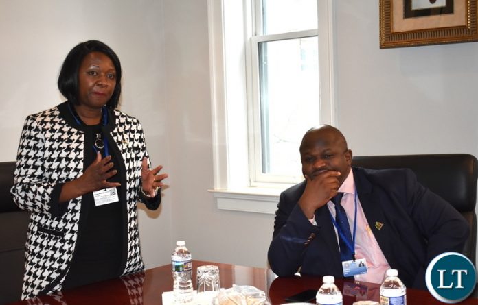 Minister of National Development Planning Alexander Chiteme (right) listening to his Finance counterpart Mrs. Margaraet Mwanakatwe address Zambian diplomats accredited to the USA when they paid a courtesy call on Zambia’s Ambassador to the USA His Excellency Dr. Ngosa Simbyakula in Washington DC on 19 April 2018. Mr. Chiteme and the Minister of Finance Mrs Margaret Mwanakatwe are participating in the IMF/World Bank 2018 Spring Meetings in Washington DC, USA. Mr. Chiteme is the Alternate Governor and Mrs Mwanakatwe is Zambia’s Governor on the World Bank Board of Governors. PHOTO| CHIBAULA D. SILWAMBA | MNDP