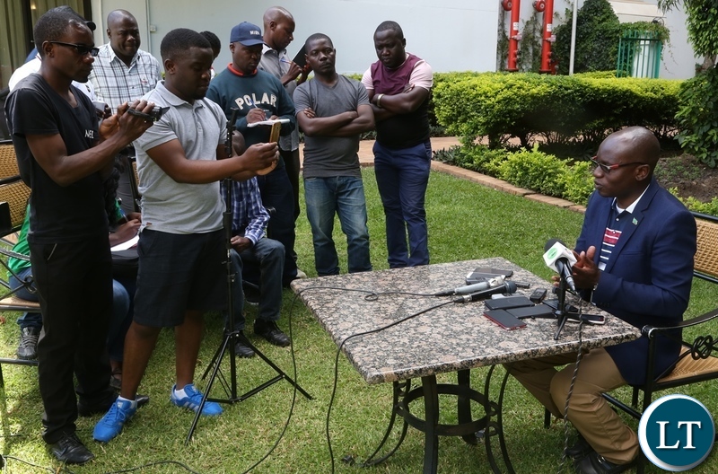 Special Assistant for Press and Public Relations to the President Amos Chanda speaking to journalists on the conduct of the Cuban Ambassador to Zambia Nelson Pages Vilas at the media briefing at Pamodzi Hote