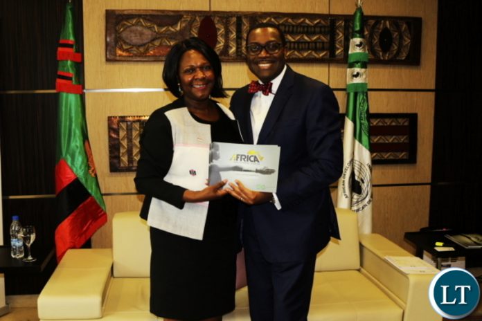 Dr. Adesina and Minister Mwanakatwe pose for a photo @ the AfDB HQ in Abidjan CIV.