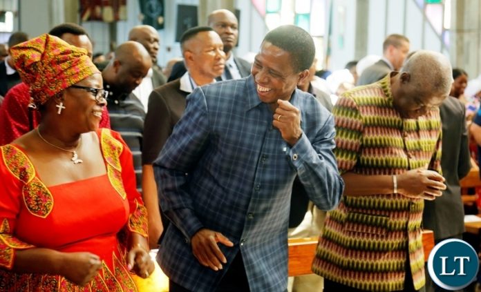 President Edgar Chagwa Lungu (centre) flanked by First Lady Esther Lungu (left) and Anglican Officials salutes the Inter Brigade during the 40th Anniversary of the Zambia-Bath and Wells celebrations at the Cathedral of the Holy Cross in Lusaka on Sunday,April 29,2018. PICTURE BY SALIM HENRY/STATE HOUSE ©2018