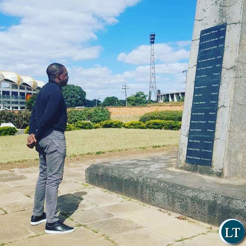 Kalusha Bwalya paying his respects to his fallen colleagues at Heroes Stadium