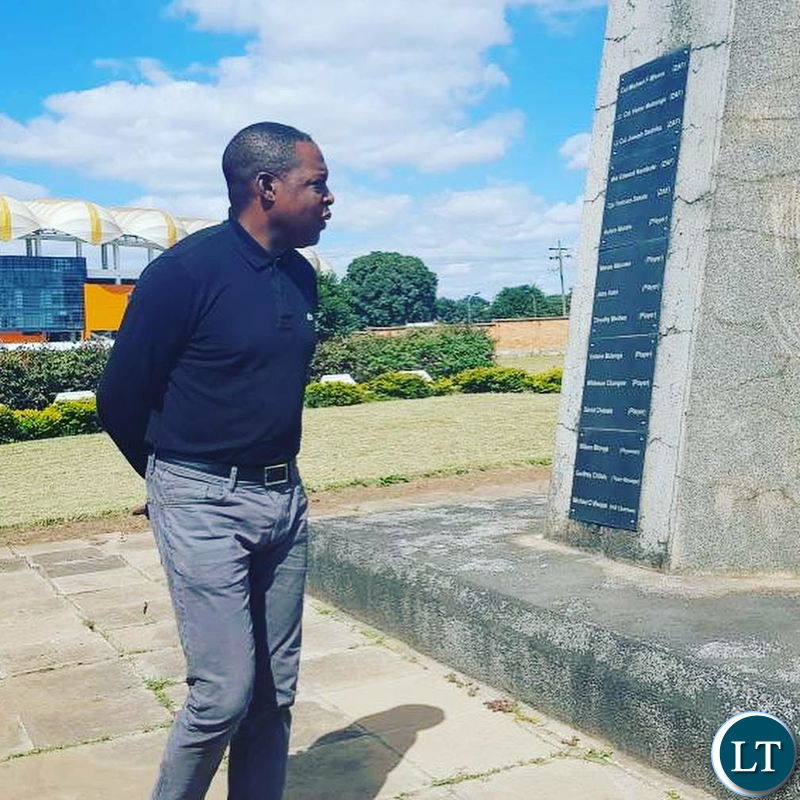 Kalusha Bwalya paying his respects to his fallen colleagues at Heroes Stadium