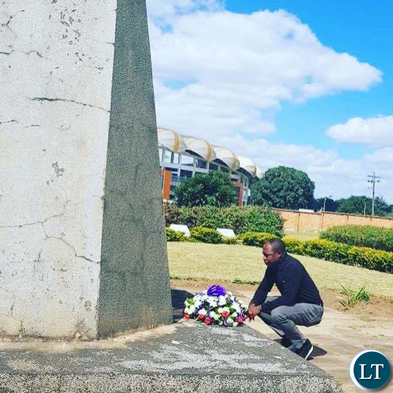 Kalusha Bwalya paying his respects to his fallen colleagues at Heroes Stadium