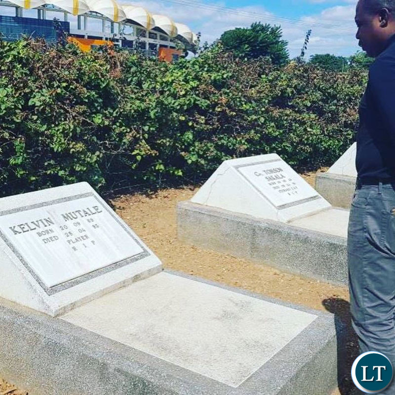 Kalusha Bwalya paying his respects to his fallen colleagues at Heroes Stadium