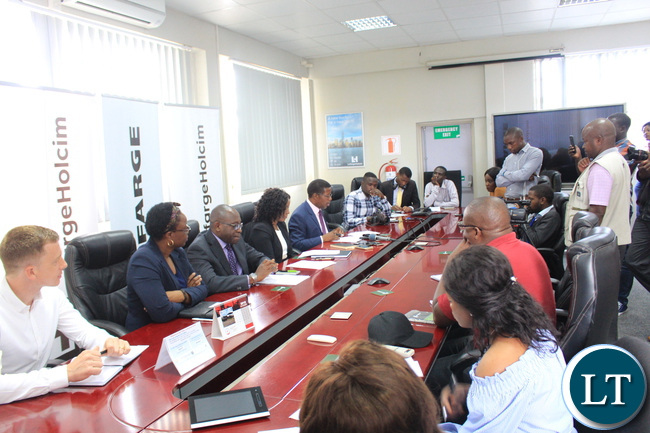 Lafarge Commercial Director Mr Giovanni Murialdo, Lafarge human Resources and Communications Director Ms Thecra Milambo, Madison General Insurance Managing Director Mr Chabala