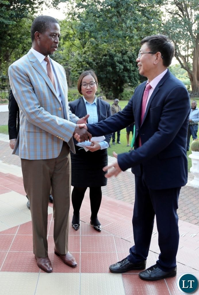 President Edgar Lungu with Mr HuaRong Zhang, the Chairman of Huajian Group of China who paid a courtesy call on the Head of State at State House today. Mr Zhang is in the country leading a business delegation from China to look at various investment prospectives. He is a member of all China Federation of Industry and Commerce, Vice-Chairman of China Africa Business Council, Chairman of Asia Footwear Industry Association and President of Guanzhou Huajian International shoes Chinese Business - Pictures By Eddie Mwanaleza 