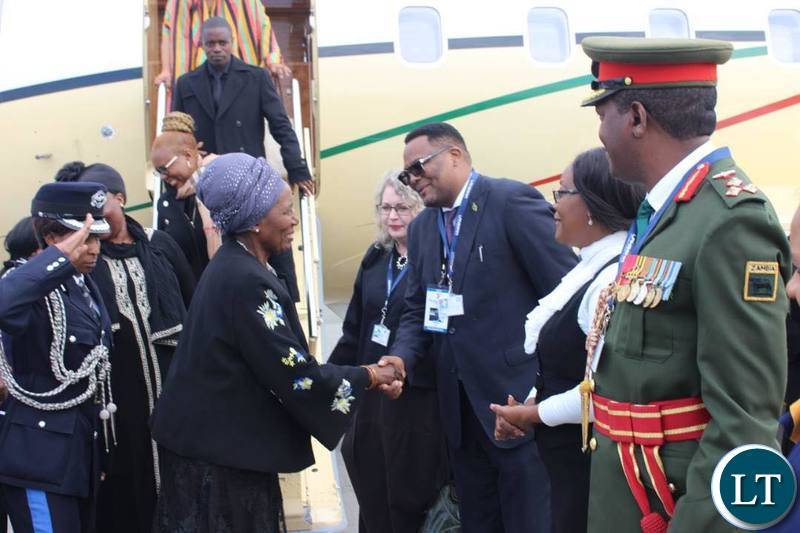 Vice President Inonge Wina greeting Zambia's Ambassador to South Africa Emmanuel Mwamba