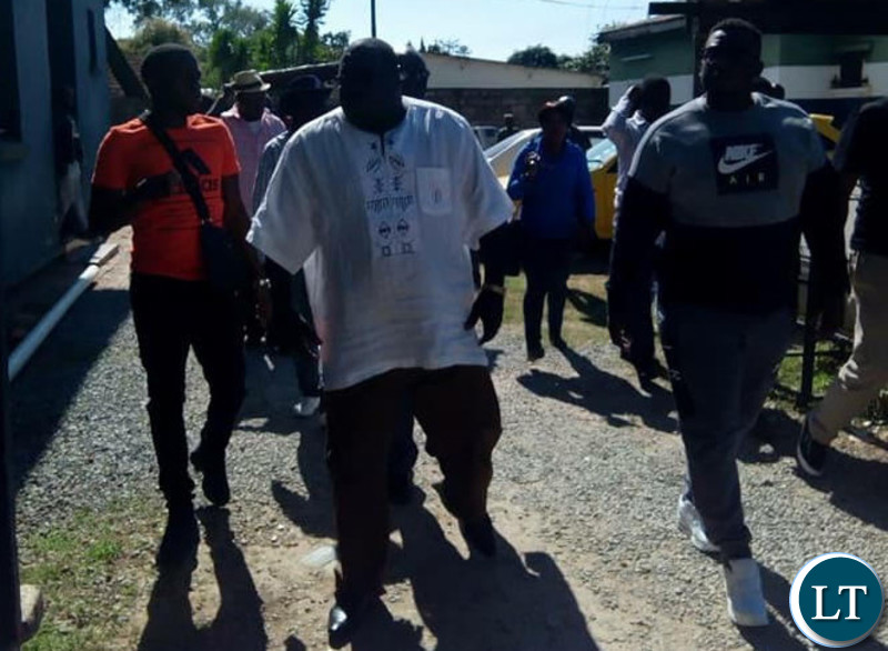 Mwanba accompanied by his father Chishimba Kambwili and his lawyer Christopher Mundia and other NDC officials.