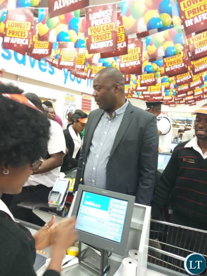 Lusaka Province Minister Mr Bowman Lusambo officiates at the official opening of Chirundu Shoprite Store. Lusaka Province Minister Mr Bowman Lusambo officiates at the official opening of Chirundu Shoprite Store.