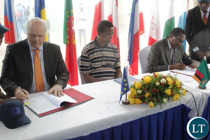 President Lungu witnessing the signing of financing agreement for small scale commercial farmers by Head of European Union Alesandrio Mariana and Fredson Yamba at the 5th Agriculture Expo in Chisamba