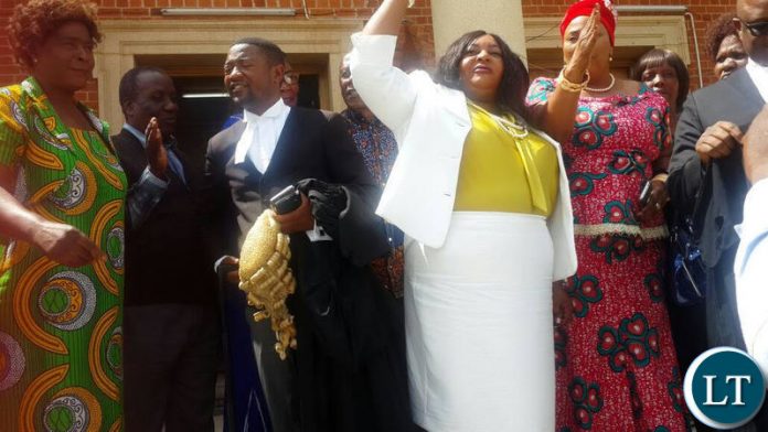 UPND's Doreen Mwamba outside Court today.