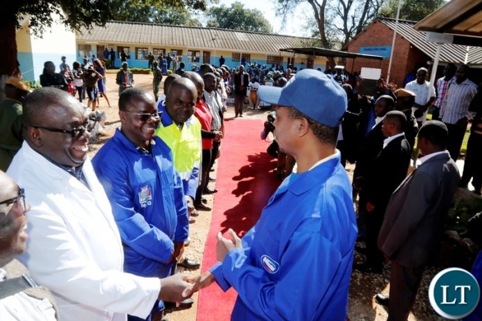 President Edgar Chagwa Lungu (right) being welcomed by Ministry of General Education Permanent Secretary Henry Tukombe (second from left) at Chakunkula Basic School during the ''Zambia plant a Million Trees Initiative and Keep Zambia Clean, Green and Healthy'' event in Lusaka on Saturday, May 26,2018. PICTURE BY SALIM HENRY/STATE HOUSE ©2018 President Edgar Chagwa Lungu (right) being welcomed by Ministry of General Education Permanent Secretary Henry Tukombe (second from left) at Chakunkula Basic School during the ''Zambia plant a Million Trees Initiative and Keep Zambia Clean, Green and Healthy'' event in Lusaka on Saturday, May 26,2018. PICTURE BY SALIM HENRY/STATE HOUSE ©2018