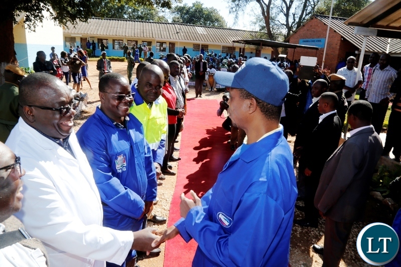 President Edgar Chagwa Lungu (right) being welcomed by Ministry of General Education Permanent Secretary Henry Tukombe (second from left) at Chakunkula Basic School during the ''Zambia plant a Million Trees Initiative and Keep Zambia Clean, Green and Healthy'' event in Lusaka on Saturday, May 26,2018. PICTURE BY SALIM HENRY/STATE HOUSE ©2018