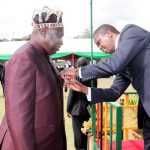 President Edgar Lungu Honor Mr Graham Kanyama – who is chief Kanyama of Mwinilunga during the investiture ceremony at State house 08I3844