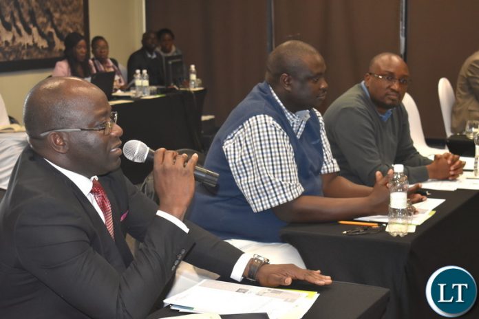 Dr. Richard Banda, MNDP Director - Monistoring and Evaluation, Mr. Mulele Mulele and PS Chola Chabala at National Designated Authority - National Consultative Stakeholders meeting on Nat. Climate Change Fund Dr. Richard Banda, MNDP Director - Monistoring and Evaluation, Mr. Mulele Mulele and PS Chola Chabala at National Designated Authority - National Consultative Stakeholders meeting on Nat. Climate Change Fund