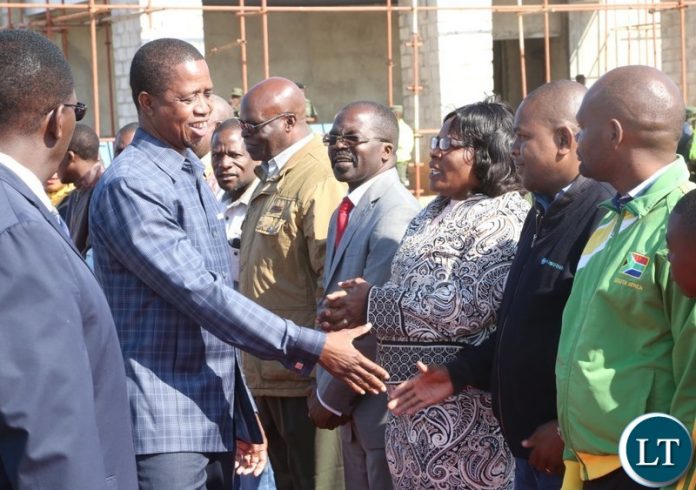 President Edgar Lungu having a light moment with PF members shortly before his departure to Eastern Province at City Airport