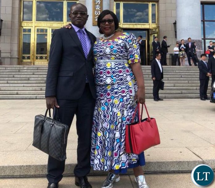 Hon Dora Siliya and Special Assistant to the President Amos Chanda outside the Chinese Great Hall government complex where they met top ranking Chinese Party and government officials