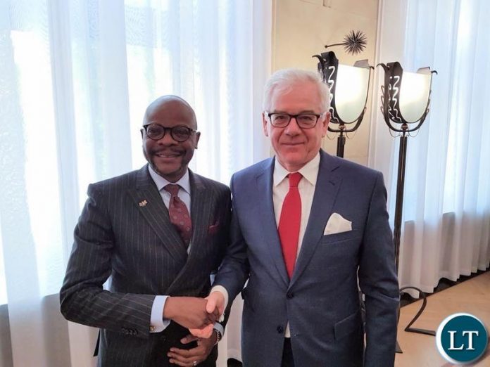 Ambassador Anthony Mukwita shares a moment with Mr Czapatowicz, Foreign Affairs Minister of Poland.