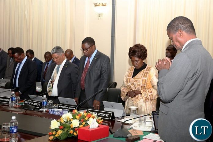 From L-R:President  Edgar Chagwa Lungu, Vice-President Inonge Wina, Foreign Affairs Minister Joseph Malanji, Justice Minister Given Lubinda and Agriculture Minister Michael Katambo prays shortly before a Cabinet meeting at State House on Friday, June 8,2018 -Pictures by THOMAS  NSAMA