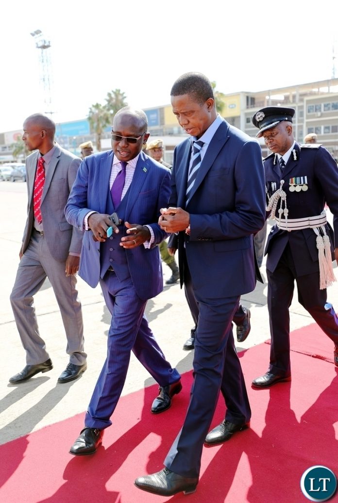 President Edgar Lungu with His Special Assistant for Press and Public Relations Mr Amos Chanda at Kenneth Kaunda International Airport before departure for a Private Visit to Kenya at the invitation of His counterpart President Uhuru Kenyatta, on Thursday, 14th June, 2018. Pictures by Eddie Mwanaleza/State House