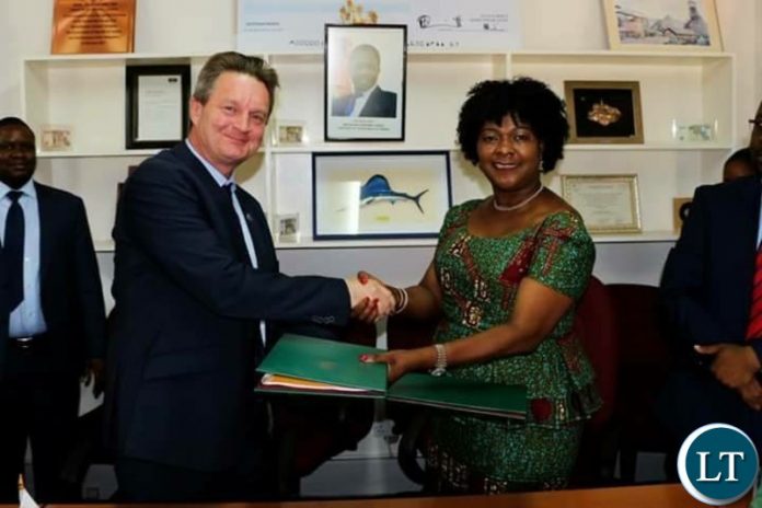 Finnish Ambassador to Zambia Timo Olkkonen with Minister of Finance Margaret Mwanakatwe