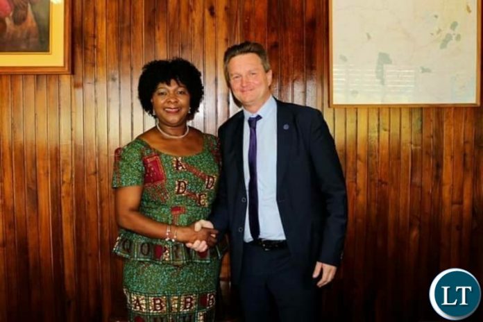 Finnish Ambassador to Zambia Timo Olkkonen with Minister of Finance Margaret Mwanakatwe