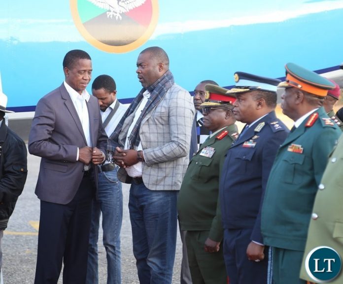 President Edgar Lungu being welcomed by Lusaka Province Minister Bowman Lusambo shortly after his arrival from Chipata at Lusaka City airport