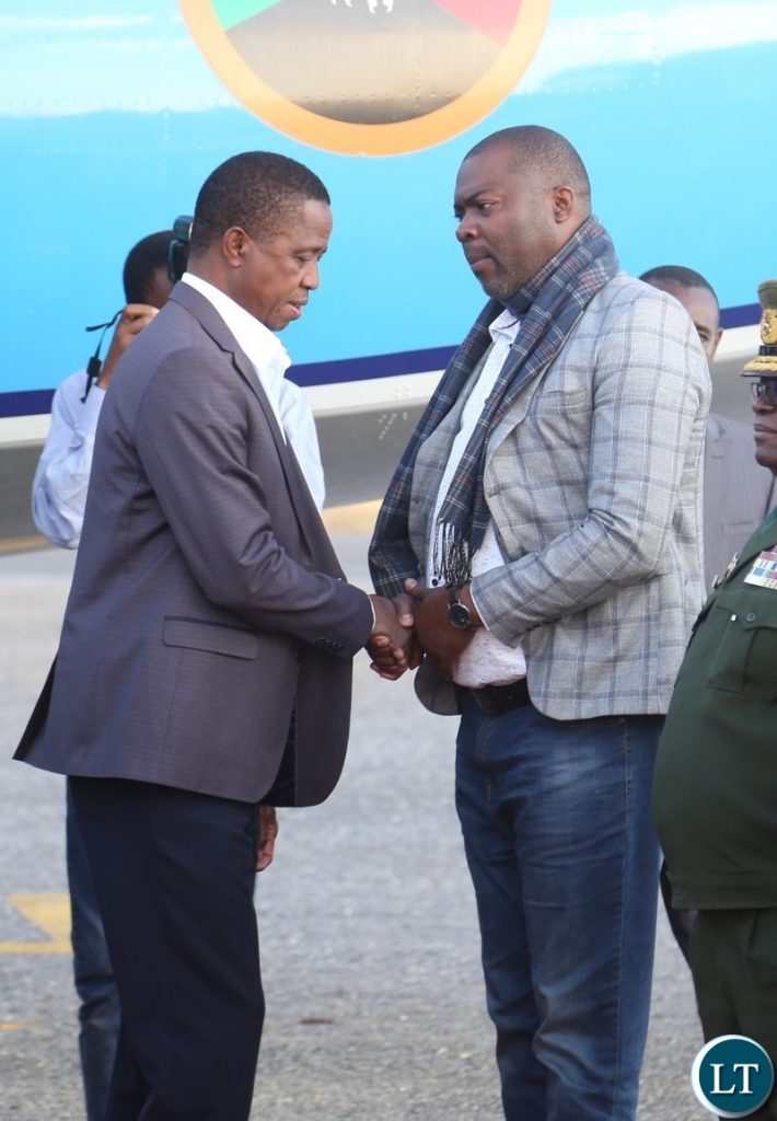 President Edgar Lungu being welcomed by Lusaka Province Minister Bowman Lusambo shortly after his arrival from Chipata at Lusaka City airport
