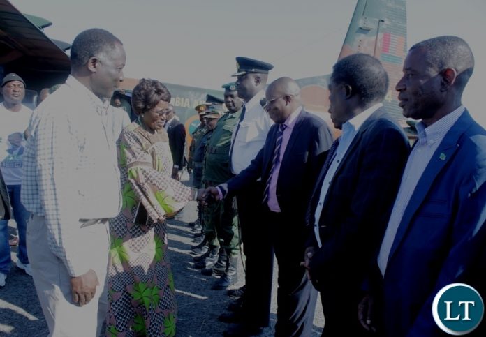 Western Province Minister Richard Kapita (L) introducing government officials (R) to Vice President Inonge Wina (C) upon Arrival at Mongu Airport for ground breaking ceremony of a Modern Clinic in Lealui Ward and Inspect progress on the Cashew Infrastructure Development Project (CIDP) in Mongu District, Western Province. Western Province Minister Richard Kapita (L) introducing government officials (R) to Vice President Inonge Wina (C) upon Arrival at Mongu Airport for ground breaking ceremony of a Modern Clinic in Lealui Ward and Inspect progress on the Cashew Infrastructure Development Project (CIDP) in Mongu District, Western Province.
