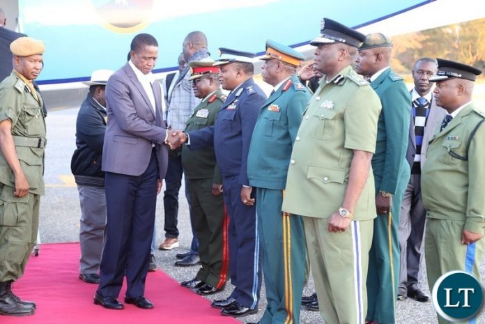 President Edgar Lungu being welcomed by Zambia Air Force commandant Lt.Gen. Eric Chimese shortly after his arrival from Chipata at Lusaka City airport