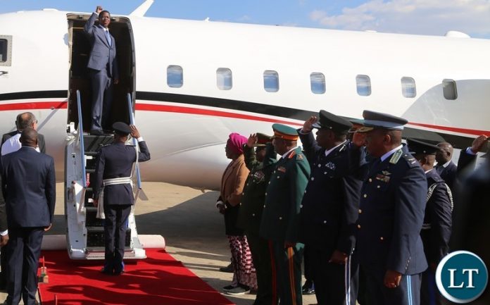 President Edgar Lungu wave the party symbol shortly before his departure for South Africa at Kenneth Kaunda International Airport President Edgar Lungu wave the party symbol shortly before his departure for South Africa at Kenneth Kaunda International Airport