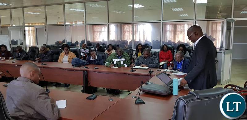 Principle Electoral Officer Mr. Steve Nyondo conducting a Commission briefing for 26th July, 2018 Elections.
