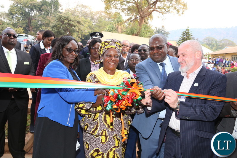 First Lady Esther Lungu cuts a ribbon with IIROSA Regional Director -Southern Africa Sheikh Walid R. EL Saadi and Health Minister Dr Chitalu Chilufya during the Commissioning of the eye hospital at Chipata Central Hospital, where she also launched an eye camp set by the Esther Lungu Foundation Trust in partnership with the International Islamic Relief Organization for Southern Africa (IIROSA) and the Ministry of Health on Tuesday, July 10,2018 -Picture by THOMAS NSAMA