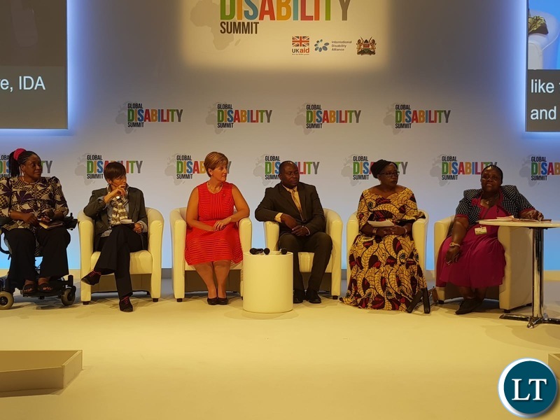 Hon.Kabanshi addressing the summit at the Global Disability meeting that was held in London