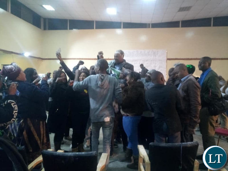Incoming Lusaka Mayor Miles Sampa airlifted by his supporters as they celebrate his victory at Nakatindi Hall.