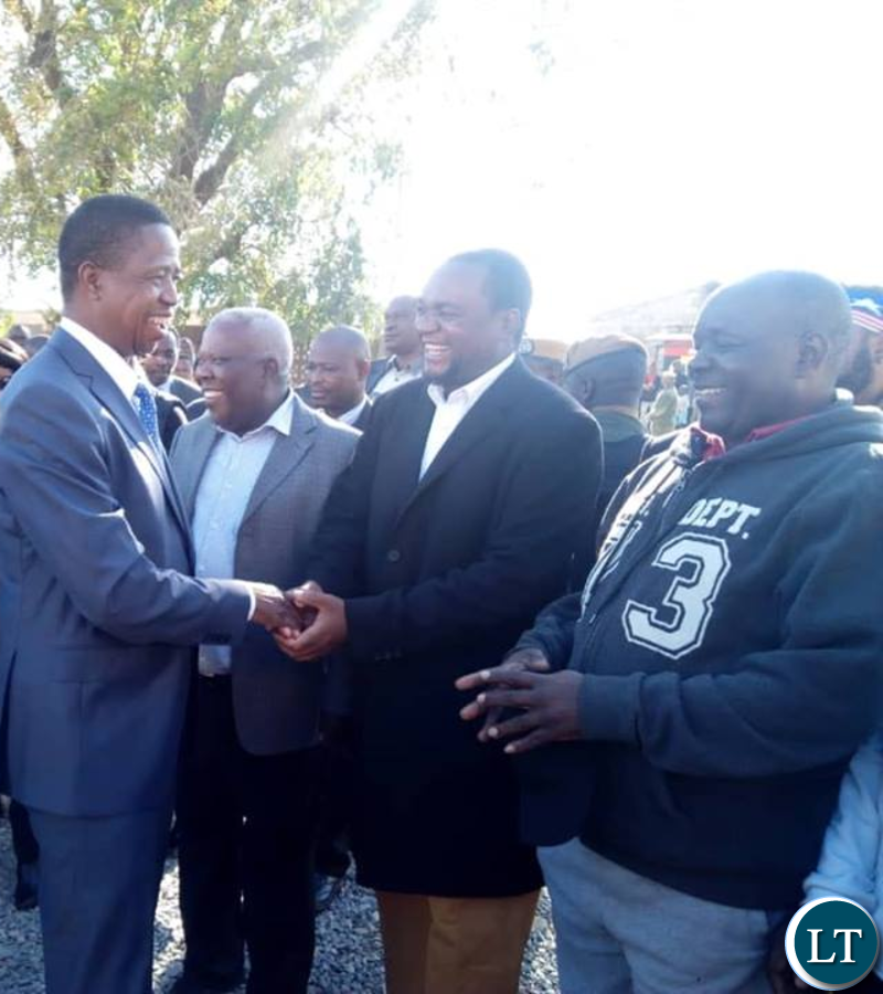 PF Lusaka Mayor aspiring candidate Miles Sampa welcoming President Lungu at Andrew Mwenya Polling station in Chawama this morning